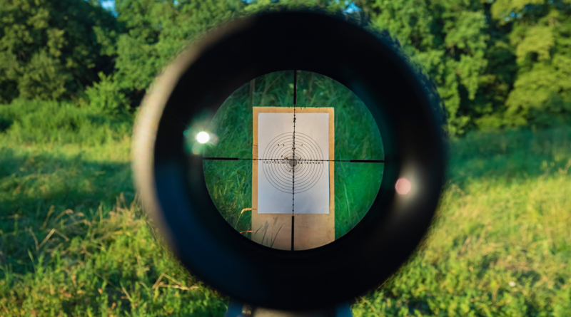 looking through a rifle scope